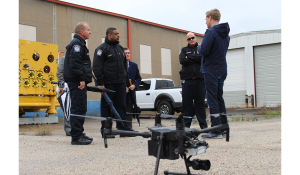 Ben Rohrbaugh (Right), Principal Investigator and CEO of Lantern UAS, demonstrates the potential of UAS-based sensors to members of U.S. Customs and Border Protection Office of Field Operations.