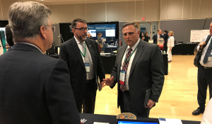 William Bryan, Senior Official Performing the Duties of the Undersecretary of Science and Technology, visits the BTI Institute booth during the 2019 COE Summit.